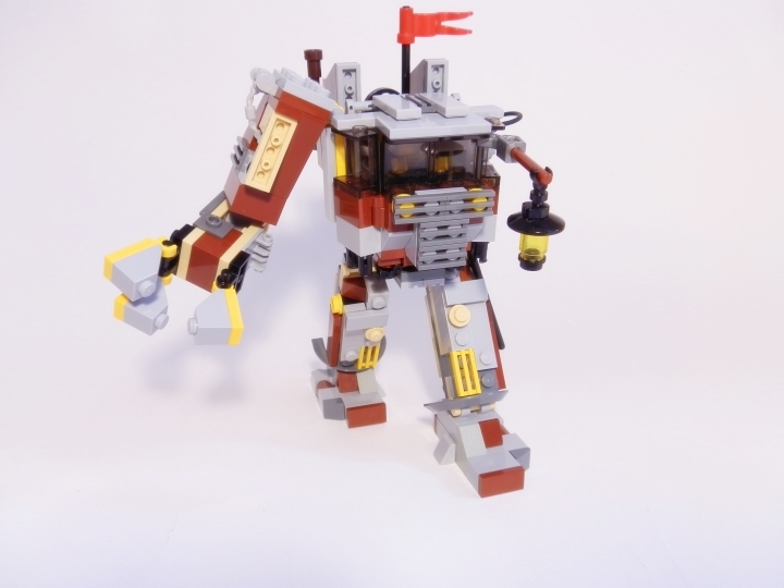 LEGO MOC - Steampunk Machine - Heavy Steam Helper 1: Немножко о функционале.<br />
Прежде всего, стоит заметить массивную руку с клешней на конце. Рука имеет три сустава, не считая тех, которые относятся к клешне.<br />
Для передвижения у робота две крепких ноги. Шаг достаточно широк, чтобы робот мог передвигаться довольно быстро по сравнению с остальными машинами.
