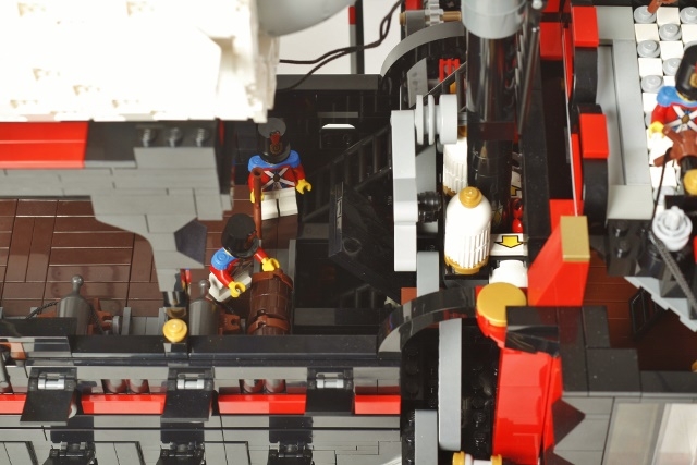 LEGO MOC - Steampunk Machine - FS-041m: как и на всяком корабле, на палубе имеется люк для спуска на нижнюю палубу, на данном фото мы видим, как члены команды грузят припасы или топливо.